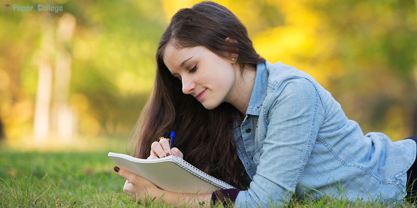 Girl Writing in a Notebook